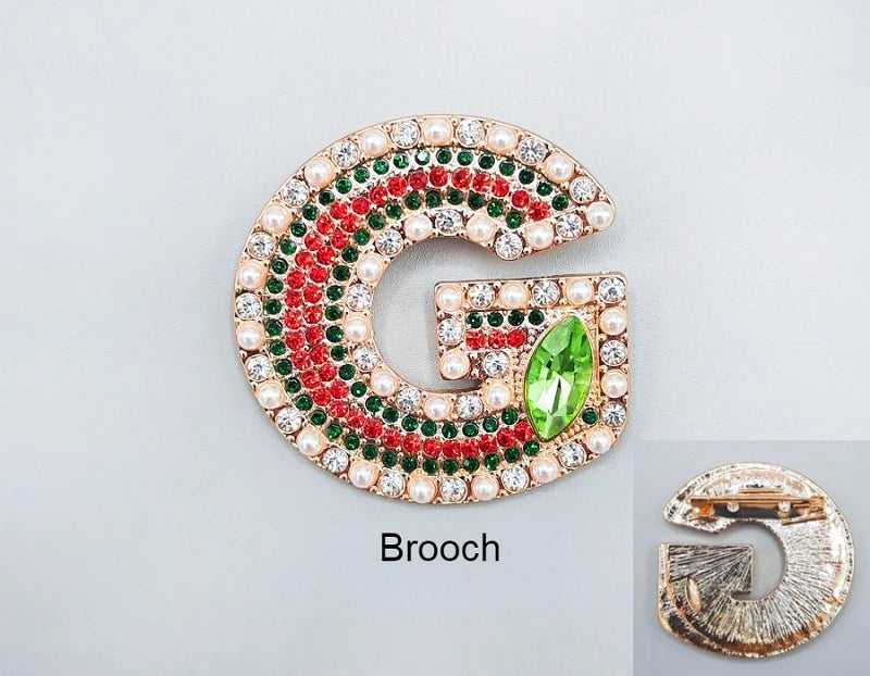 G Brooch